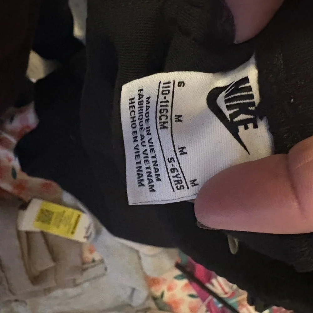 Nike Kids Black Joggers with White Logo